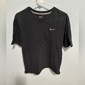 Women’s size Large regular for black Nike T-shirt. Gently used. 100% Cotton.